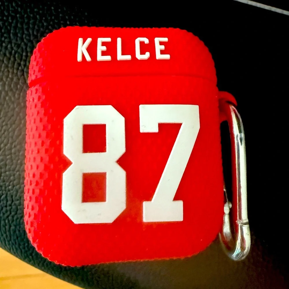 Used Apple AirPods, 2nd generation. NFL brand Kansas City Chiefs case.